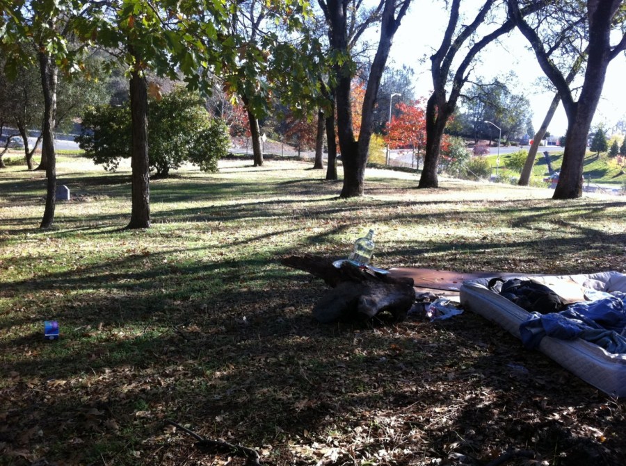 Homeless bed and grave in 'park' in Auburn, CA